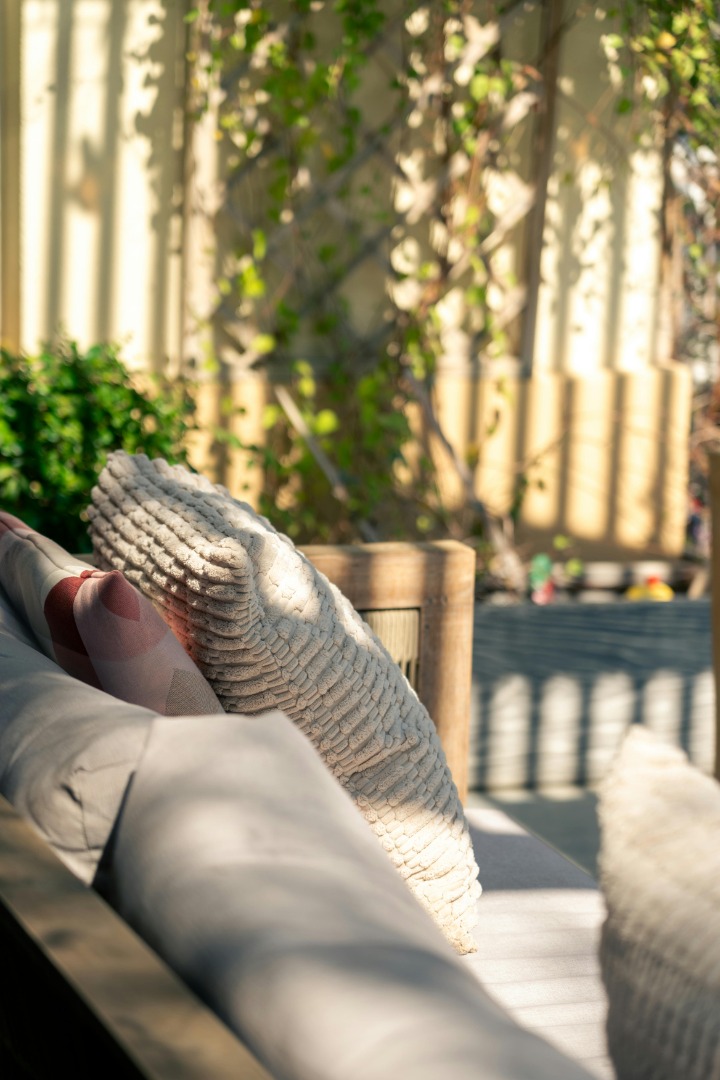 Effective methods for removing stubborn stains from outdoor furniture cushions to restore their beauty and freshness